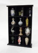 Black collectors shelf unit and contents of 12 modern Japanese miniature porcelain vases and a pair