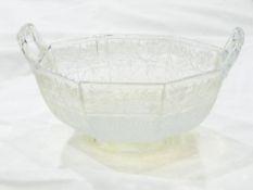 Sowerby octagonal vaseline pressed glass two-handled bowl, the panels decorated with flowers, 16.