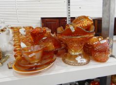 Quantity of carnival glassware including bowls, cups, candlesticks, etc.