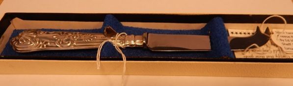 Silver-handled cheese knife by Viners Limited,