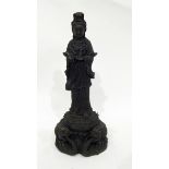 Cast metal model of an Eastern woman supported on lotus flower with sea creatures beneath,