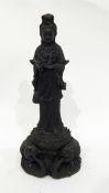 Cast metal model of an Eastern woman supported on lotus flower with sea creatures beneath,