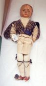 Early 20th century paper head and soft-bodied doll in Turkish-style dress and an Oriental puppet