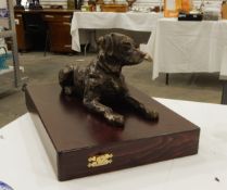 Bronzed model of a recumbent labrador,