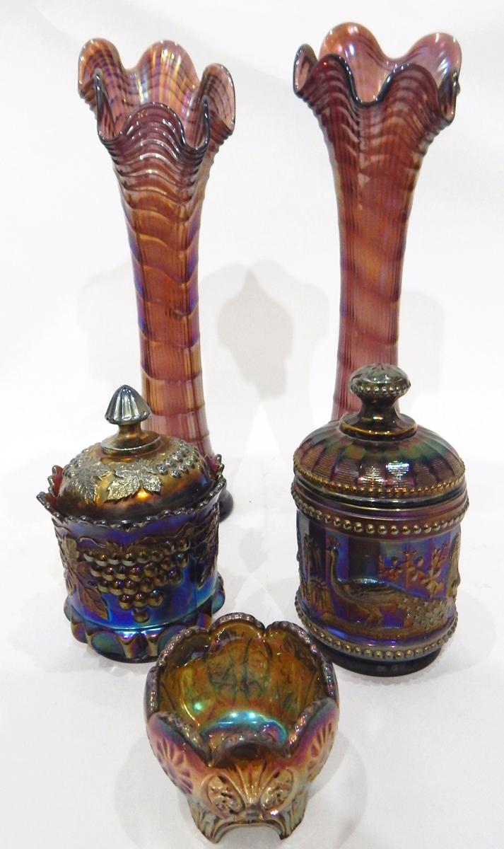 Pair of amethyst carnival glass vases with flared rims,