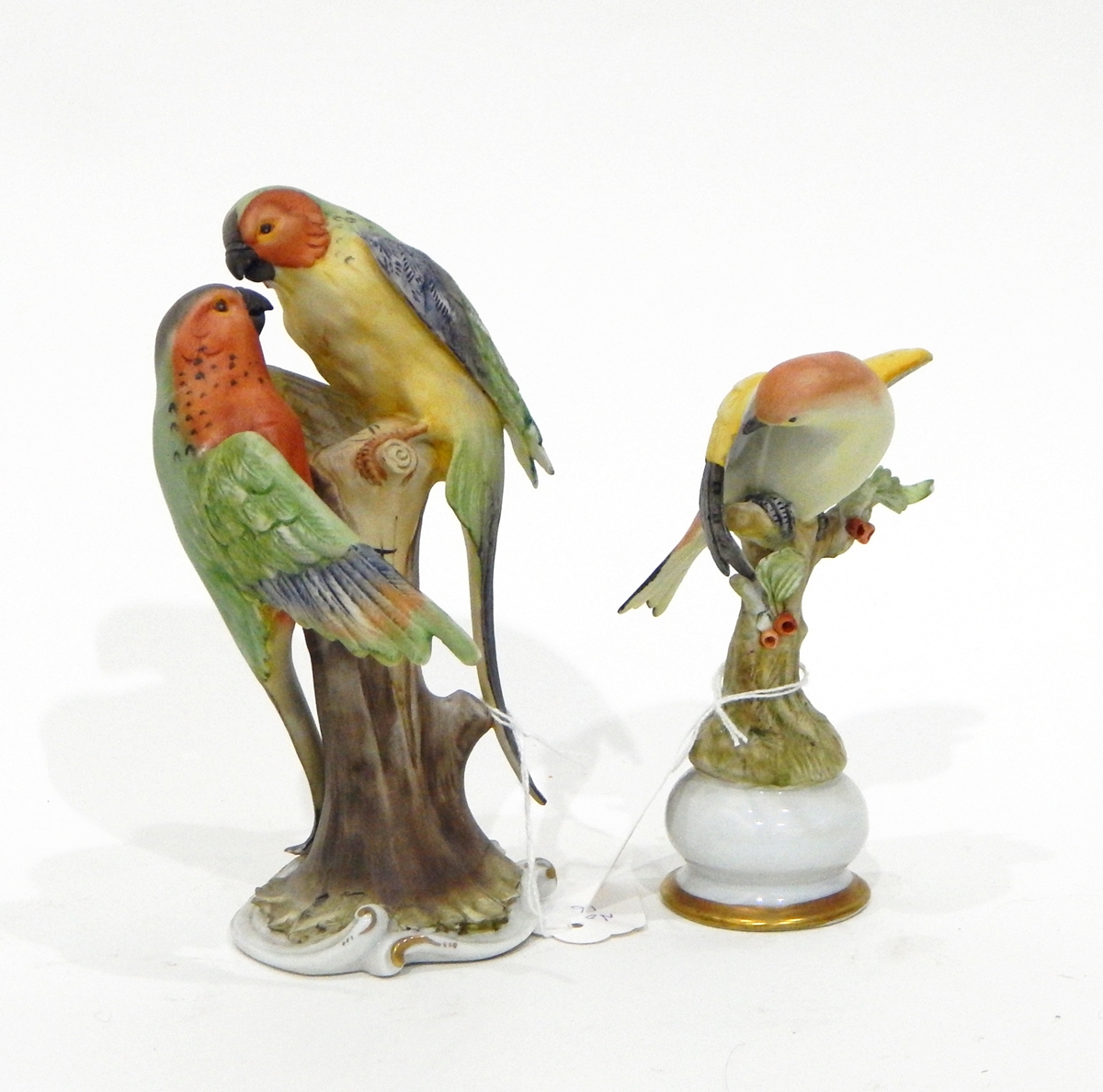 13 Capodimonte bird ornaments including a pair of love birds perched on a branch, a blackbird,