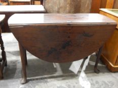 18th century mahogany drop-leaf oval-top gateleg table on turned tapering legs with pad feet,