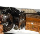 Quantity of carved wooden models of elephants, African figures, boxes, etc.