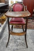 Bentwood child's high chair with rising tray,