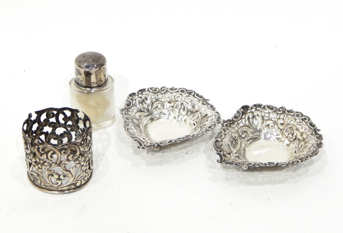 Pair of late Victorian silver bonbon dishes with open fretwork borders,