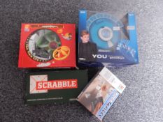 Boxed games including 'The Galactic Flyer', 'Yahtzee', 'Scrabble', 'Escalado',