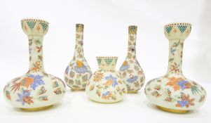 Suite of Victorian opaque glass vases comprising two pairs of bottle vases and a smaller squat vase,