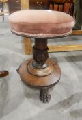 19th century mahogany piano stool with circular rising top, on column support,