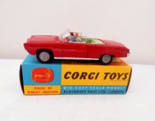 Corgi Chrysler Imperial 246, red with figures and golf clubs in the boot,