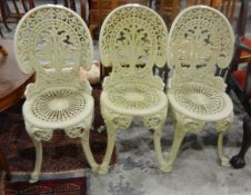 Set of three painted aluminium garden chairs,