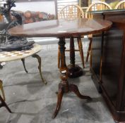 Mahogany circular top occasional table on turned pedestal with splayed legs,