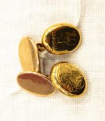 Pair of double-oval and chain gold-coloured cufflinks, unmarked, 10g approx.