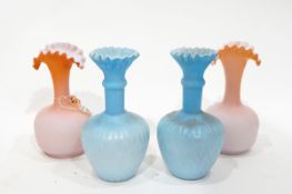 Pair of late Victorian blue satin glass vases of bottle form with flared folded necks, approx.