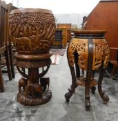 Oriental carved hardwood jardiniere on stand,