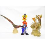 Murano glass figure of a clown, 31cm high, a Murano glass model of two fish on the crest of a wave,