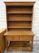 Modern stained pine kitchen dresser with open shelf plate rack, two frieze drawers,