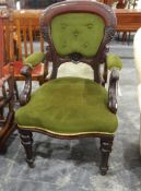 Victorian mahogany balloon-back open armchair with buttoned panel to back, padded arms,