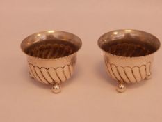Pair of Victorian silver salts by Horrace Woodward & Co, London 1889, of half-fluted circular form,