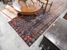 Handmade Eastern wool belouch rug with deep blue ground,