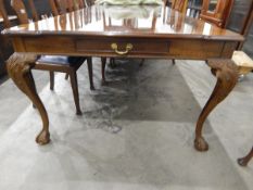 Reproduction Georgian-style mahogany dining table of rectangular form with two leaves,