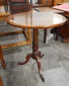 Mahogany circular top tripod table on turned column support, splayed legs,