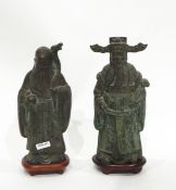 Collection of 20th century copper and brass Oriental figures on stands