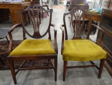 Two mahogany Hepplewhite-style shield-back open armchairs with pierced splats, upholstered seats,