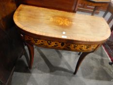 Georgian mahogany and satinwood inlaid foldover top card table, the top with floral inlay,