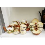 Quantity of Devon Watcombe pottery cottage and motto ware table teaware including eggcups,