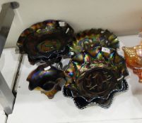 Two black carnival glass bowls, each decorated in the kingfisher pattern, registration no 4184,