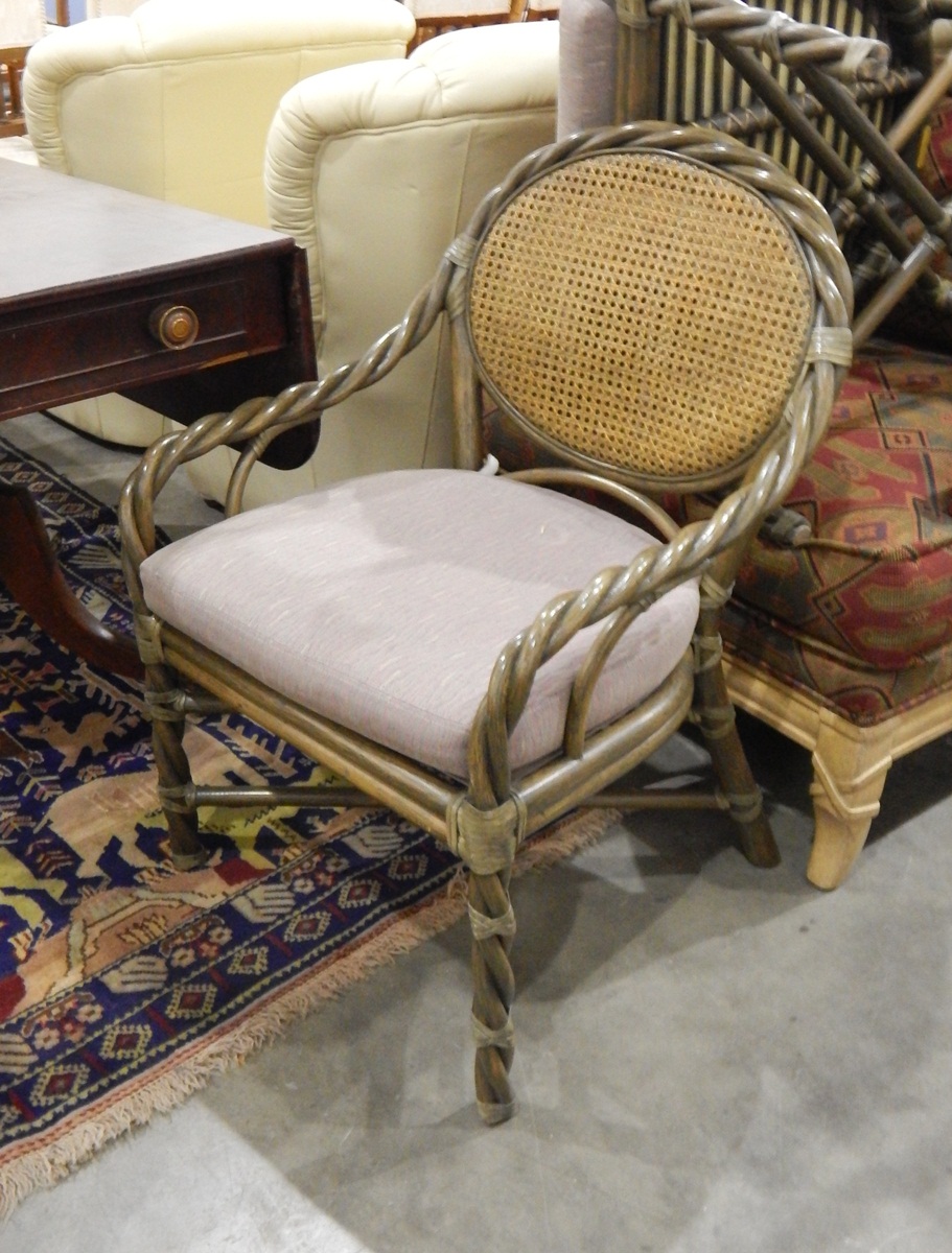Set of four twisted bentwood open arm chairs by McGuire of Canada upholstered seat pads,