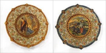 Two Wilhelm Schiller & Sohn majolica plates of moulded decoration with central allegorical scenes,