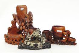 Collection of Oriental carved hardstone inkwells, vases, etc.
