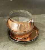 Four Eastern copper bowls and plates (4)