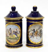 Pair of early 20th century Sevres lidded cylindrical canisters in bleu du roi,