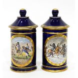 Pair of early 20th century Sevres lidded cylindrical canisters in bleu du roi,
