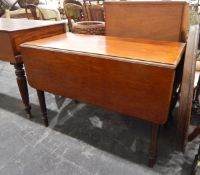 19th century mahogany drop-flap dining table with moulded edge, on turned legs,