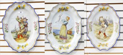 Set of three late 20th century Quimper oval wall plates with frilled decoration, handpainted,