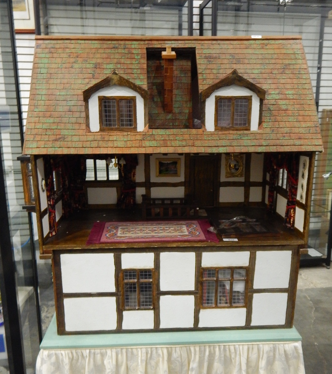 Tudor-style large doll's house, modelled on a Ledbury town house, fixed onto a table, - Image 2 of 2