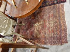 Chinese wool rug in cream, pink, red and green and an Eastern style rug,