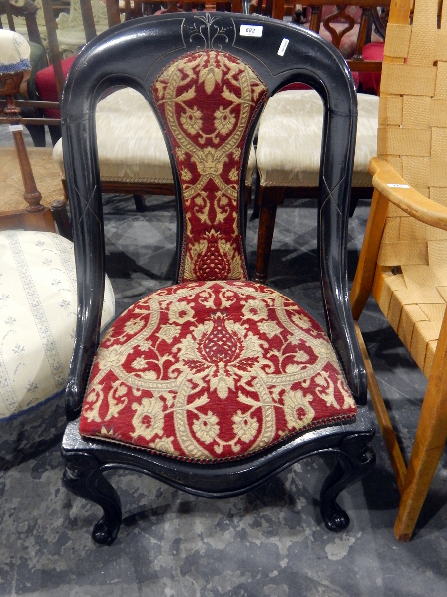 Victorian ebonised spoon back occasional chair with upholstered splat and seat,