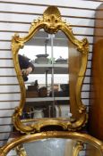 Modern wall mirror in gilt frame with scallopshell surmount and one other (2)