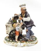 Large Capodimonte figure group 'Ice Cream Vendor', 31cm high, another 'Shoemaker and Family',