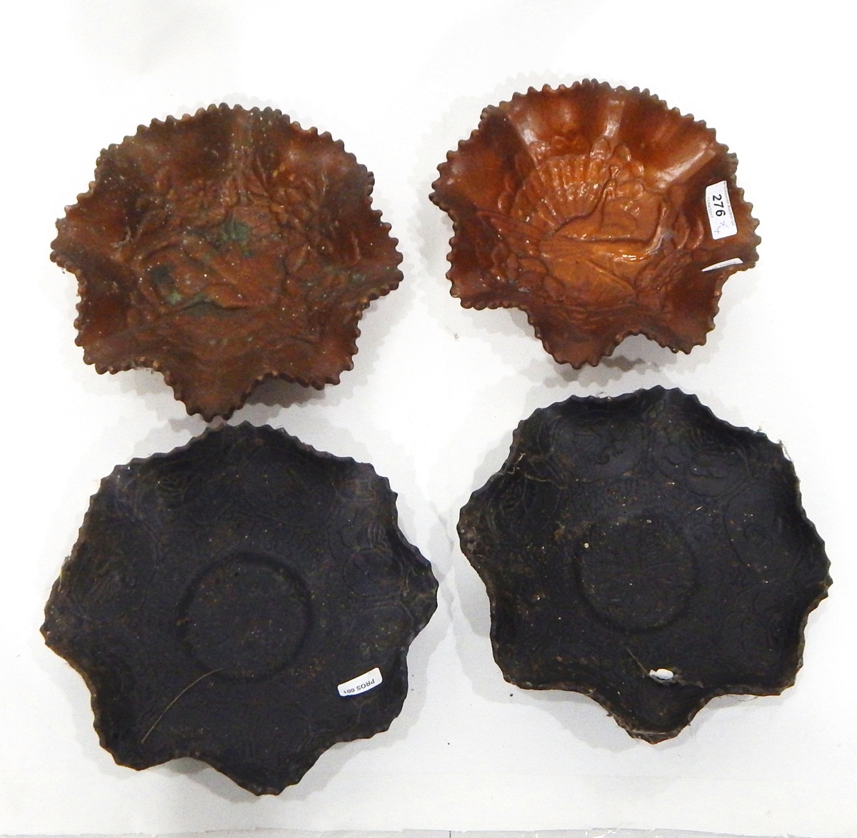 Pair of late 19th/early 20th century cast iron crinkle plates with moulded aesthetic-style