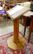 Arts & Crafts style oak lectern, the rectangular top on octagonal column and base,